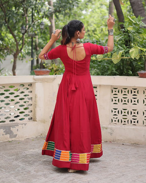 Maroon Color Roman Silk Multi Threaded Work Navratri Gown