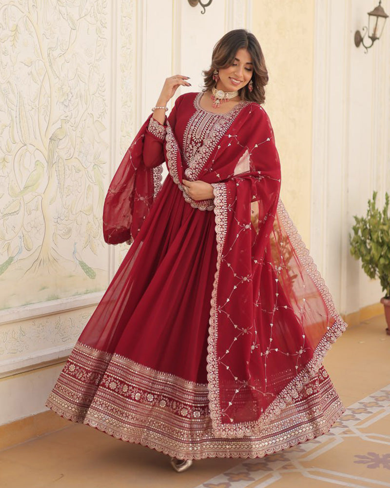 Maroon Color Faux Blooming Rich Sequence Embroidered Gown