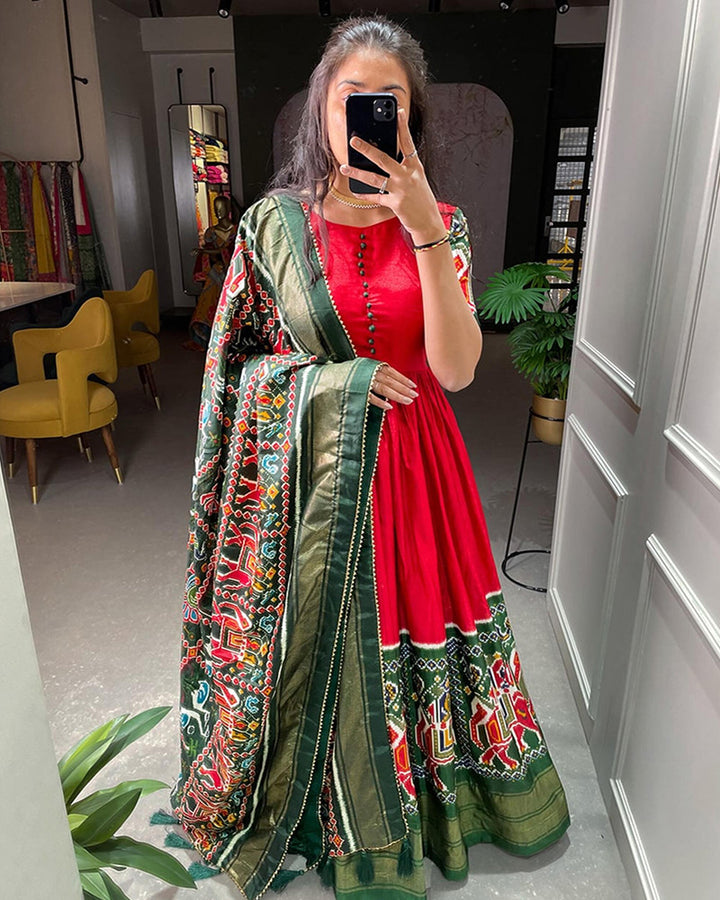 Red Color Patola Printed Dola Silk Fully Flair Gown