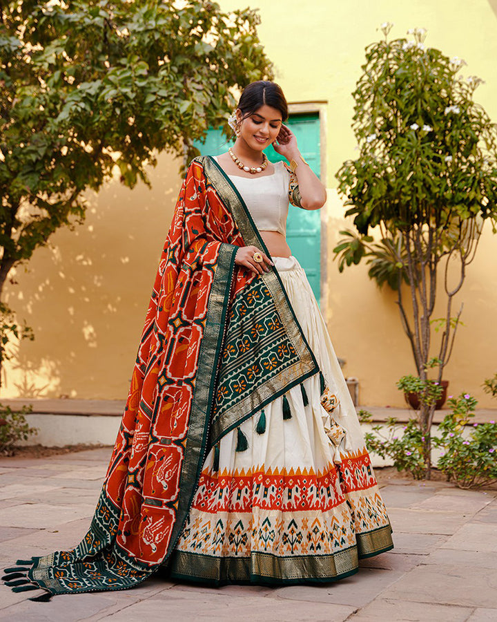 Amazing Orange Color Patola Printed Tussar Silk Lehenga Choli