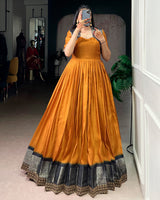 Mustard Color Dola Chex Zari Weaving Gown