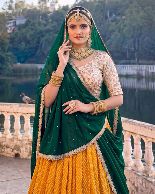 Royal Marwadi Yellow Color Bandhani And Ajarakh Print Lehenga Set