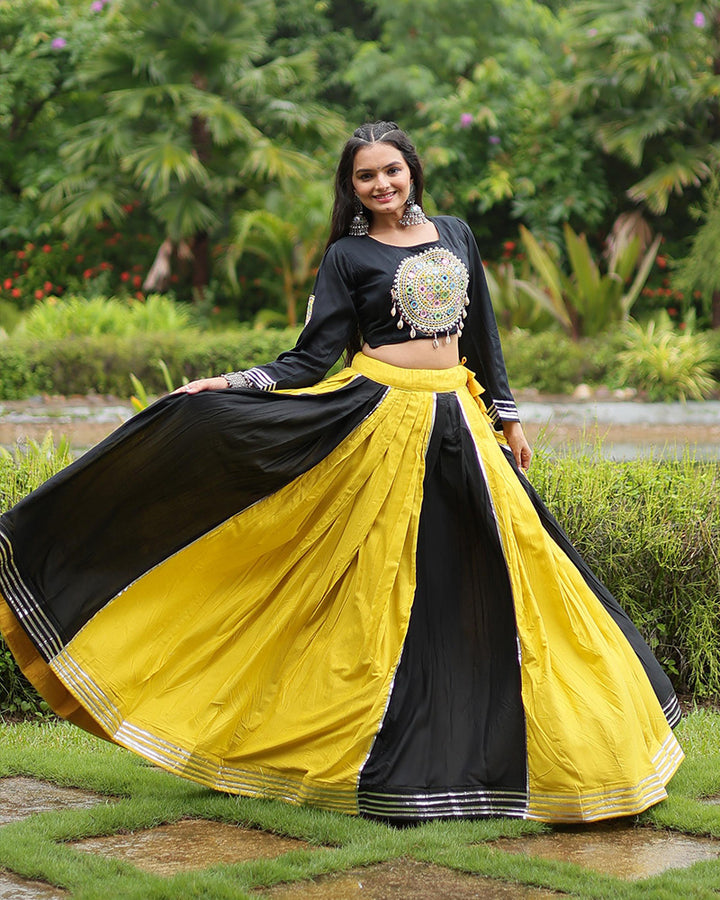 Navratri Wear Yellow And Black Color Rayon And Cotton Lehenga Choli