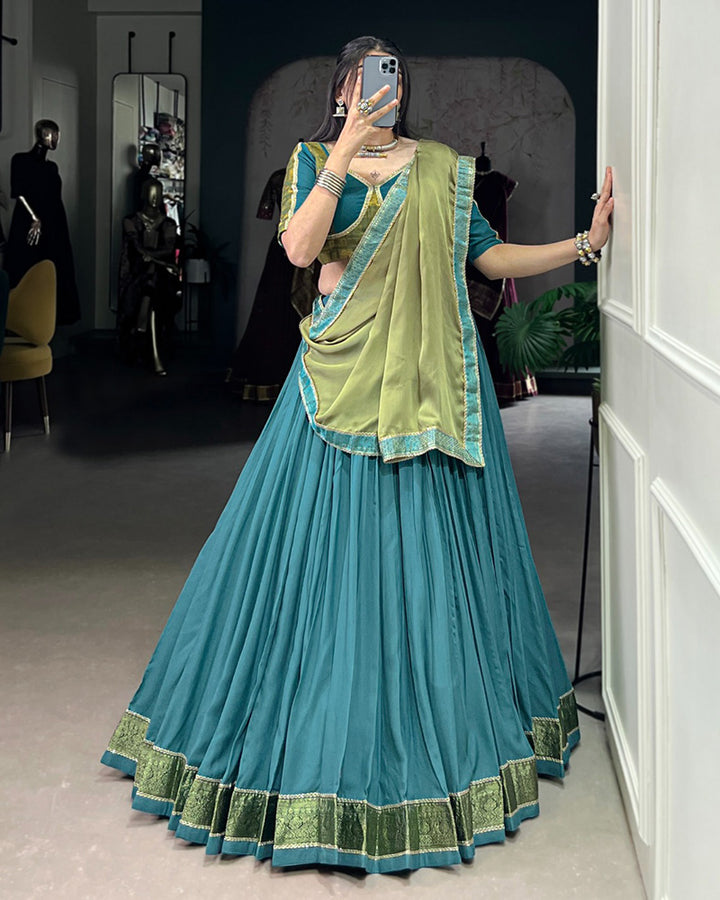 Teal Green Color Rayon Zari Weaving Navratri Lehenga Choli