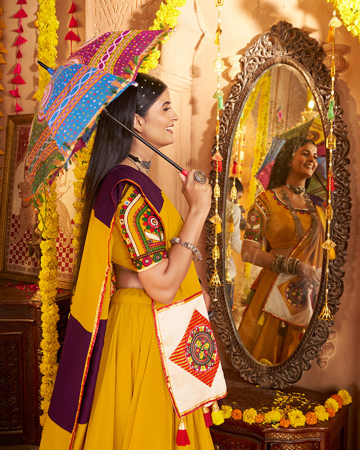 Traditional Mustard Yellow Color Mirror Work Navratri Lehenga Choli