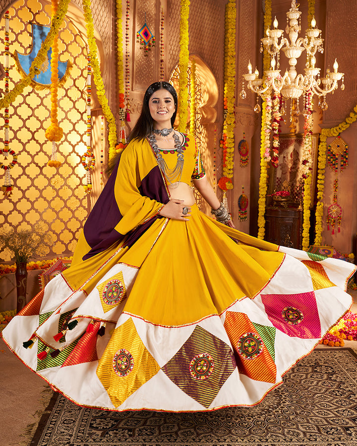 Traditional Mustard Yellow Color Mirror Work Navratri Lehenga Choli