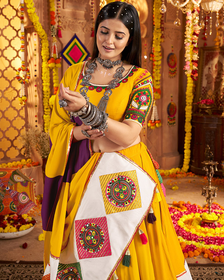 Traditional Mustard Yellow Color Mirror Work Navratri Lehenga Choli