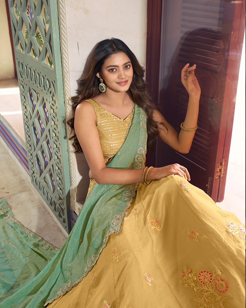Yellow Color Moss Silk Embroidered Lehenga Choli