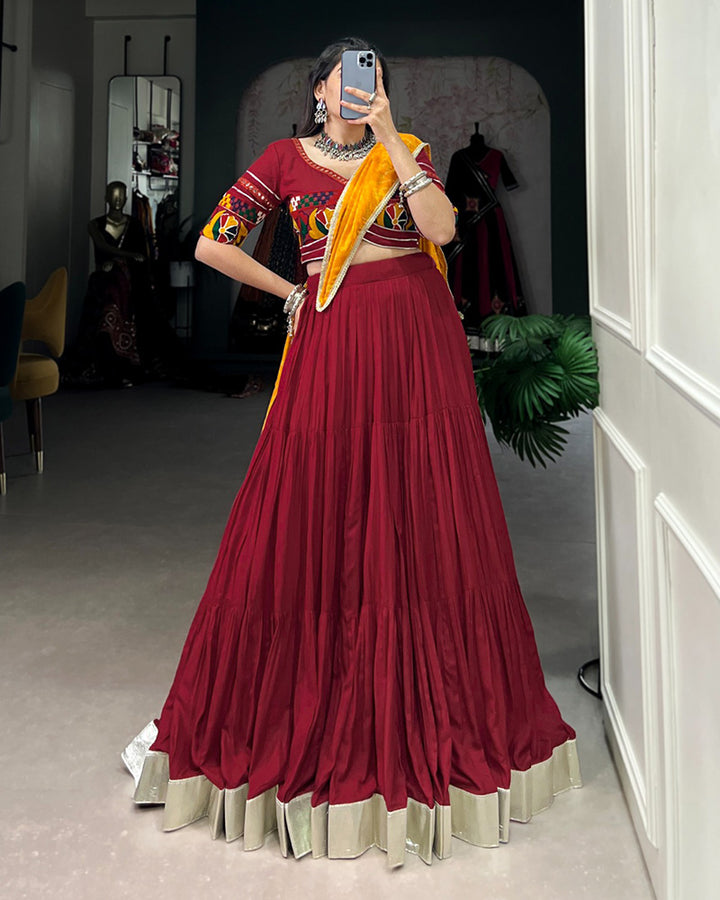 Navratri Wear Maroon Color Rayon Ruffle Style Lehenga Choli