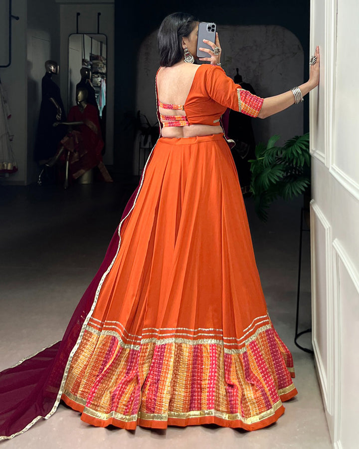 Orange Traditional Rayon Bandhej Lehenga Choli For Navratri