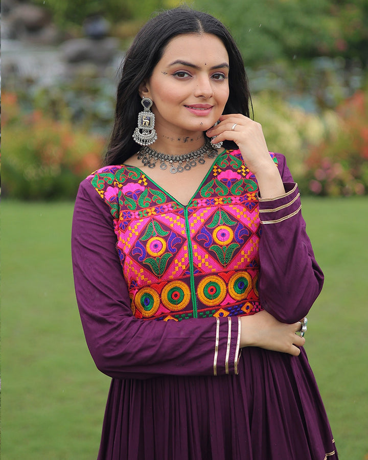 Designer Wine Flared Navratri Gown With Mirror Work Yoke