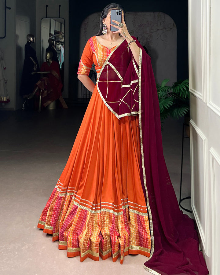 Orange Traditional Rayon Bandhej Lehenga Choli For Navratri