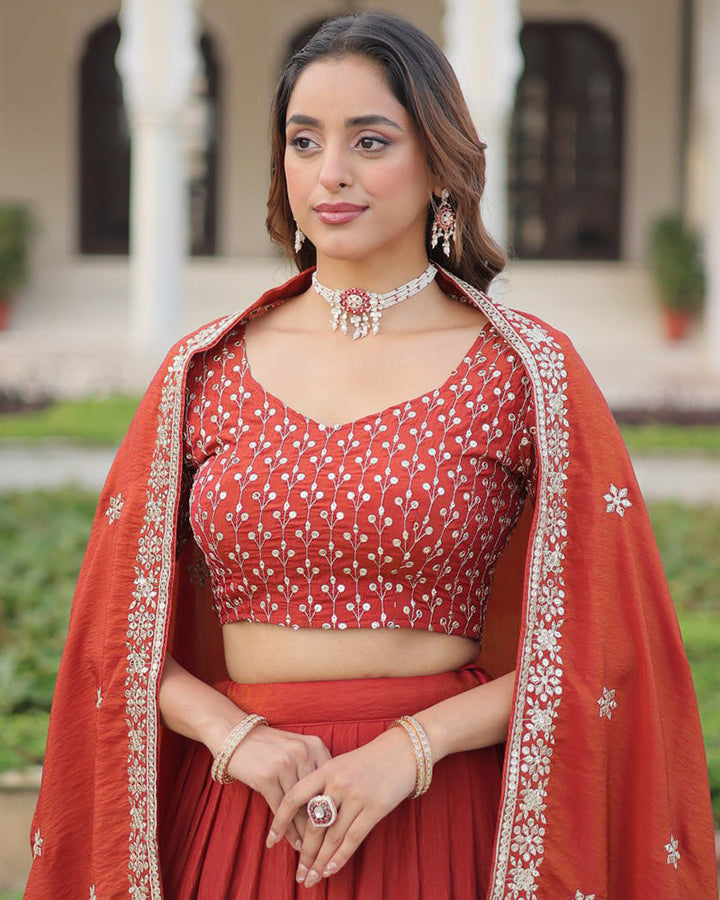 Rust Orange Color Vichitra Silk Embroidered Lehenga Choli