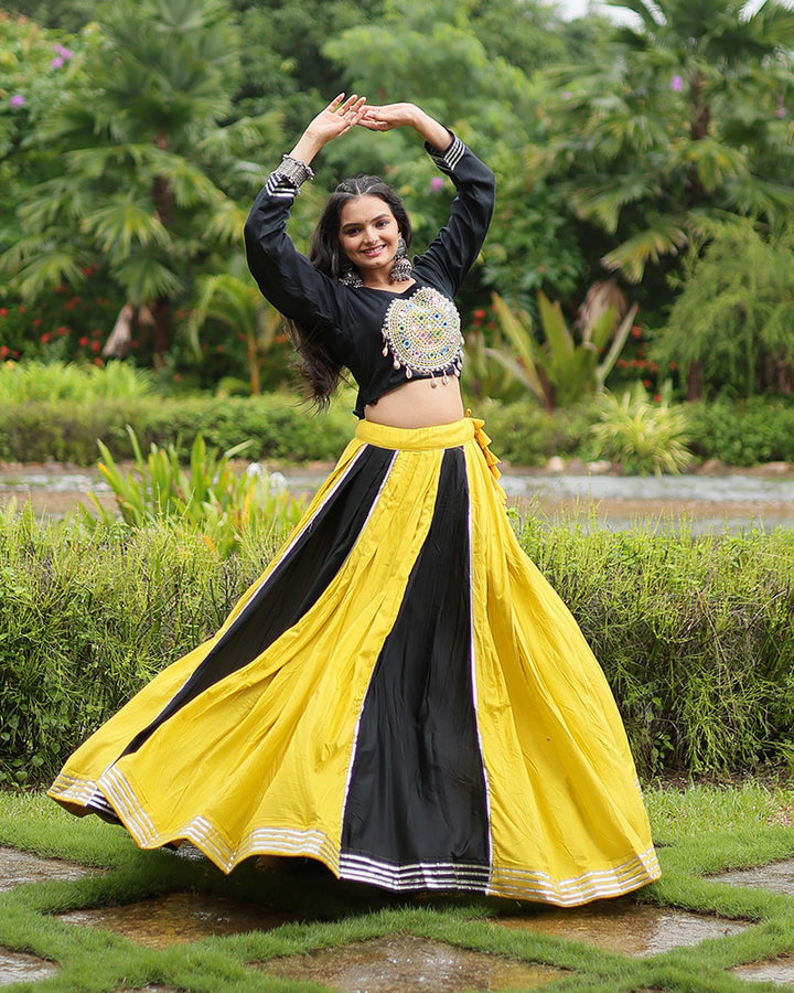 Navratri Wear Yellow And Black Color Rayon And Cotton Lehenga Choli