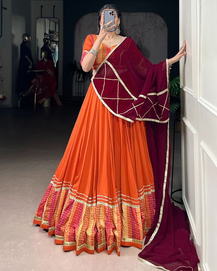Orange Traditional Rayon Bandhej Lehenga Choli For Navratri