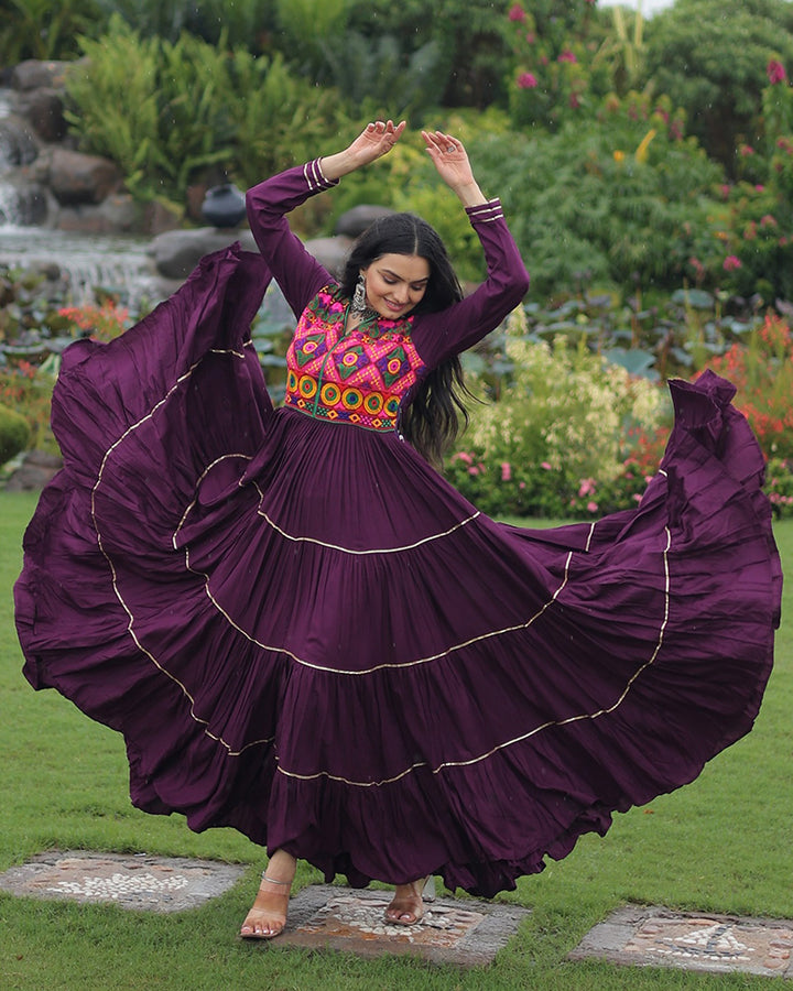 Designer Wine Flared Navratri Gown With Mirror Work Yoke