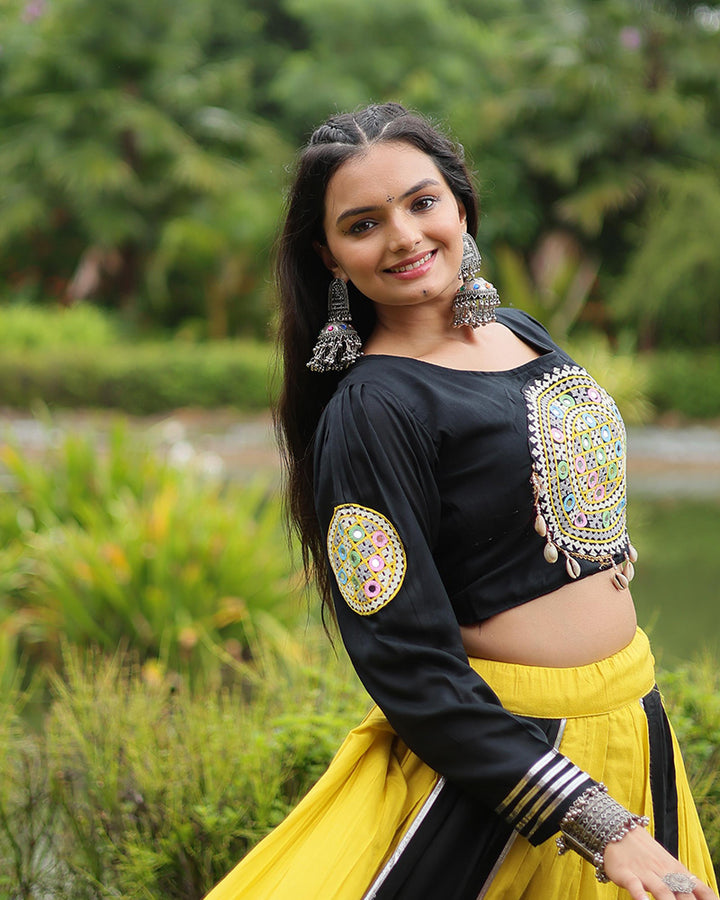 Navratri Wear Yellow And Black Color Rayon And Cotton Lehenga Choli