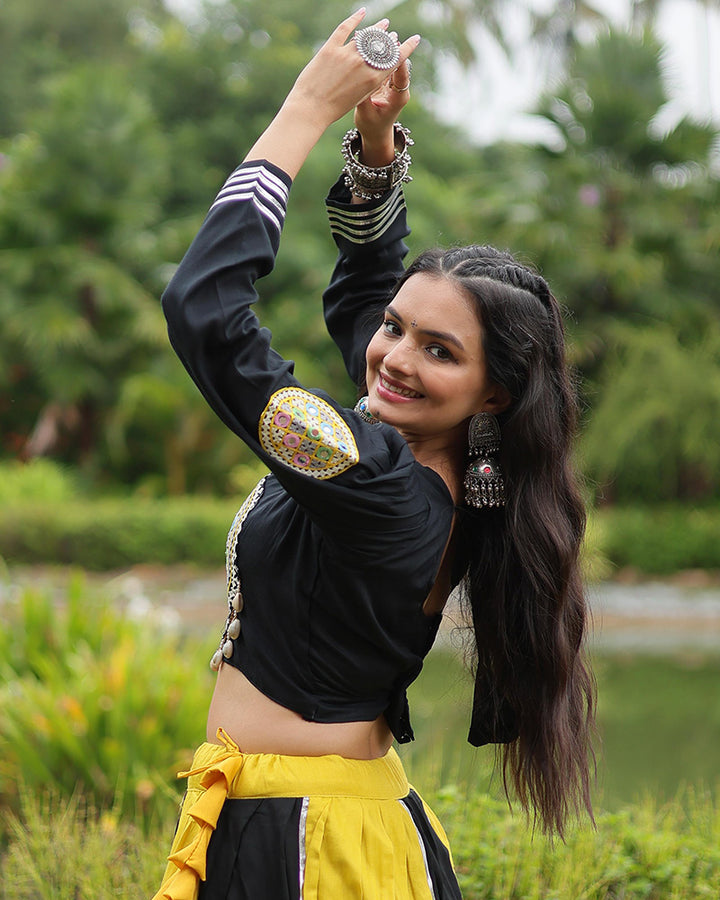 Navratri Wear Yellow And Black Color Rayon And Cotton Lehenga Choli