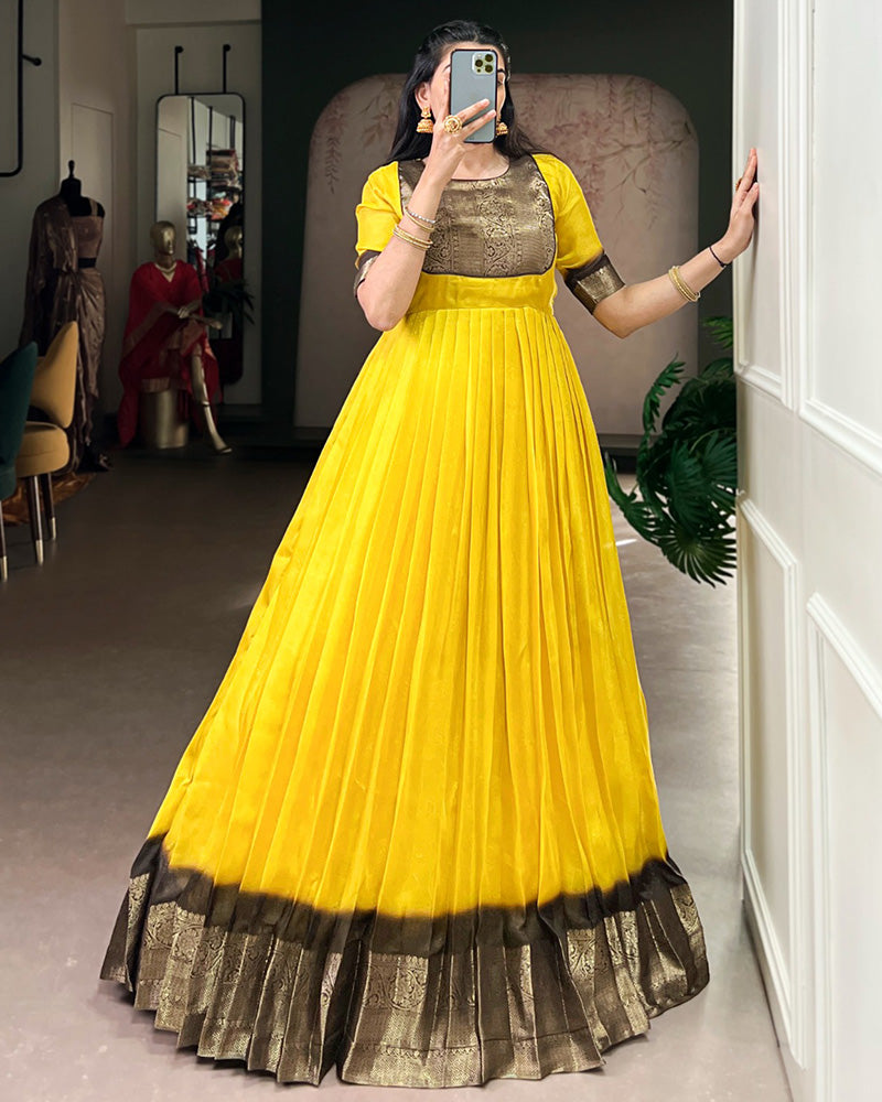 Yellow Color Mass Mello Zari Weaving Gown