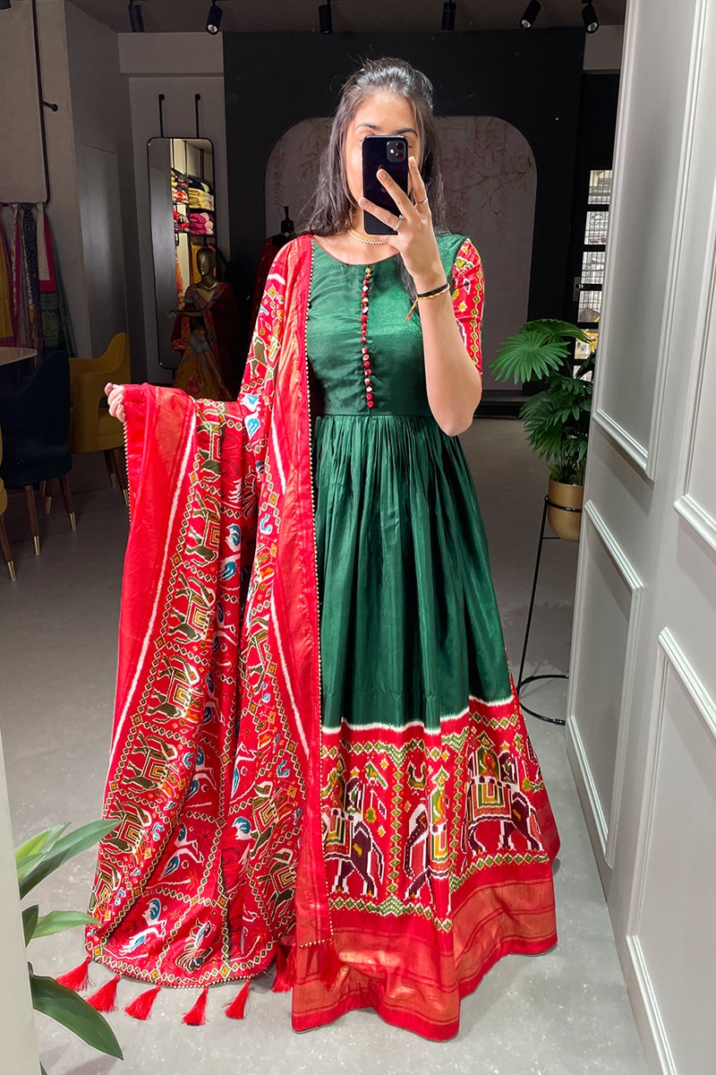 Green Color Patola Printed Dola Silk Fully Flair Gown