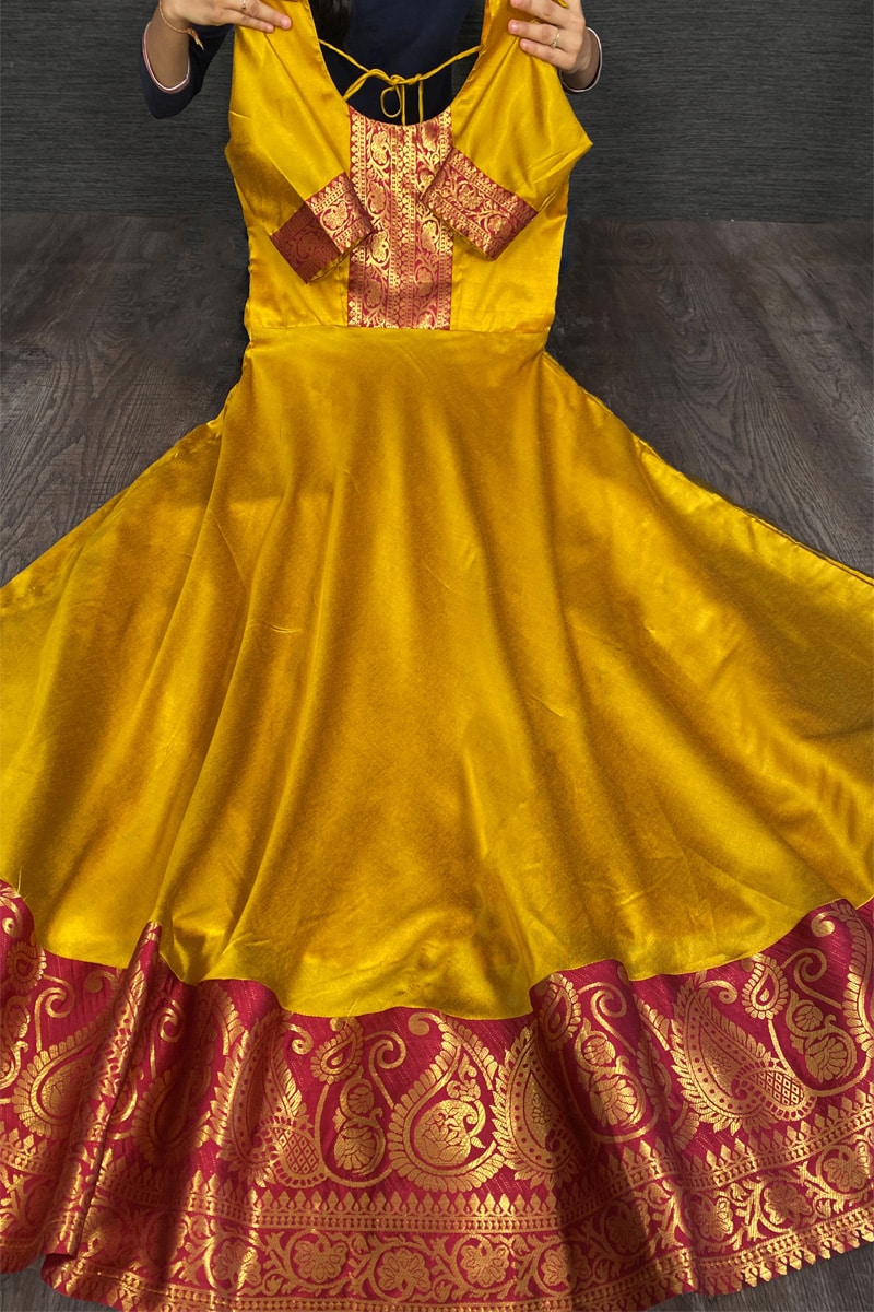 Mustard Yellow Color Weaving Zari Work Silk Gown